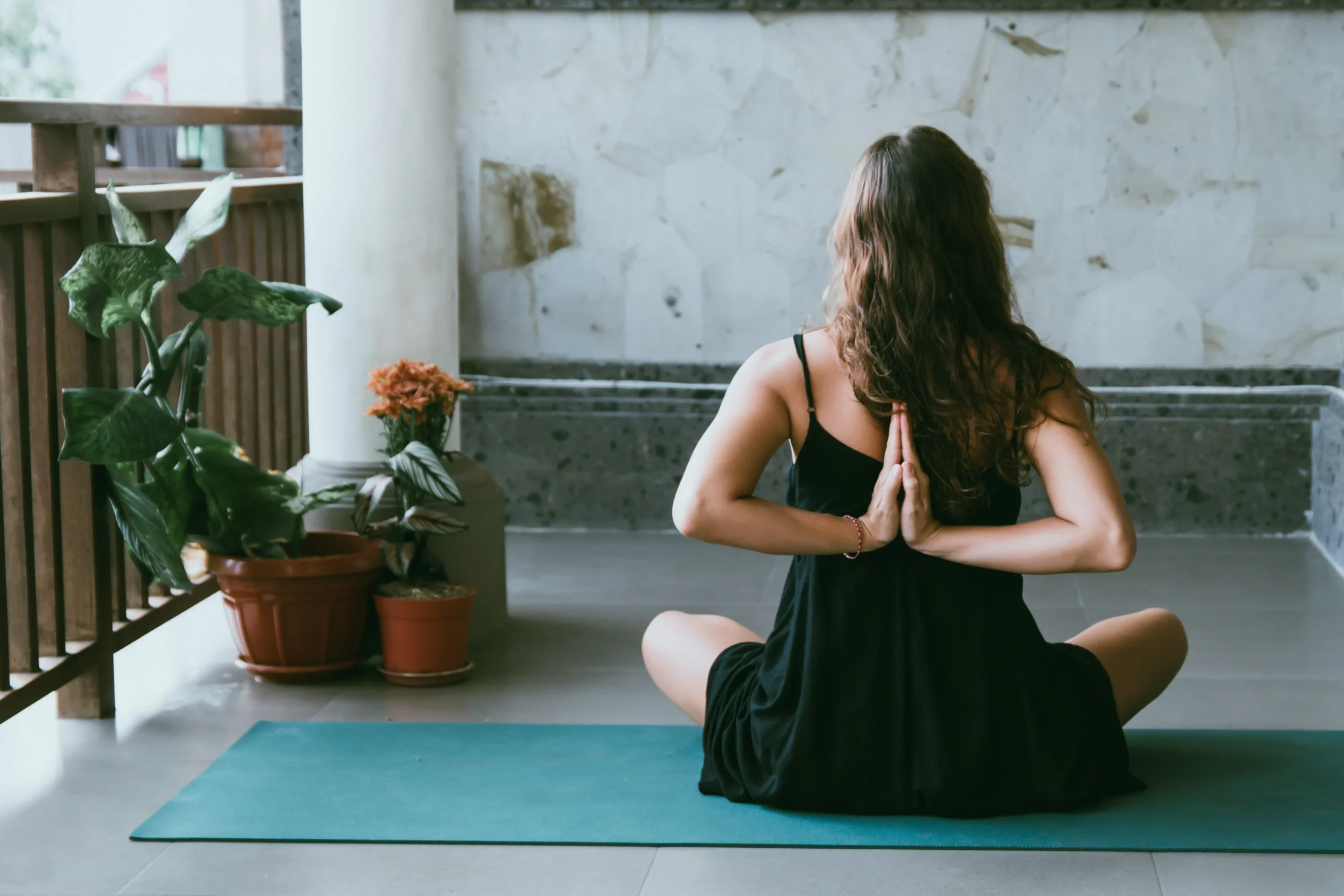 wellness stock image, woman doing yoga seated