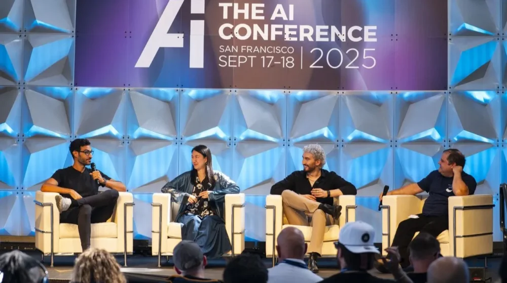 The AI Conference in san francisco - with speakers on stage seated in a panel discussion